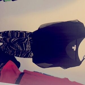 Black dress with gold and sliver swirls on bottom